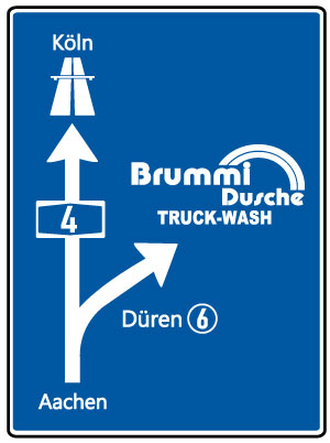 Simple erklärtes Anfahrtsschild der Brummi Dusche Truck Wash Düren mit Hinweis der Autobahn-Nähe A4.
